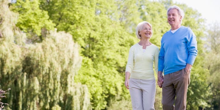 May contain: tree, plant, walking, person, vegetation, head, happy, face, woman, adult, female, man, male, and laughing